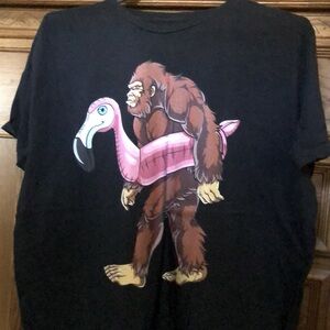 Black T-Shirt with Bigfoot and Flamingo Graphic